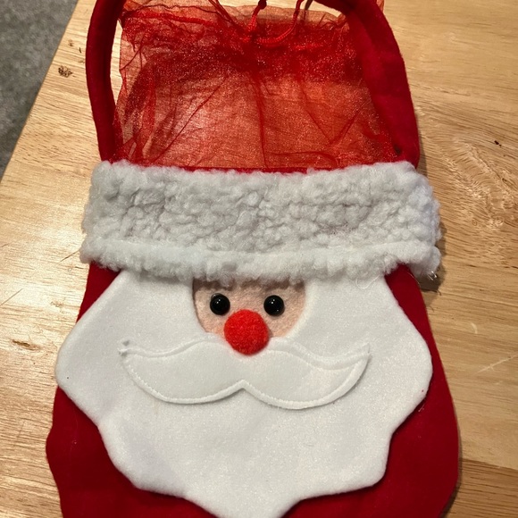 Santa gift bag with a Santa mug. Perfect for the holiday gift exchange. - Picture 2 of 2